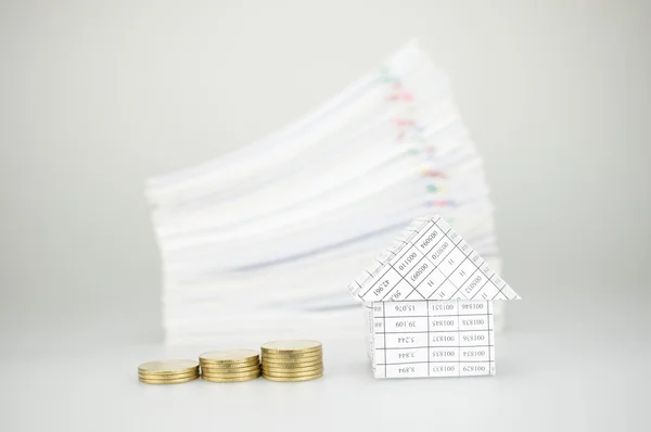 Close up step gold coins and house with blur paperwork — Stock Photo, Image