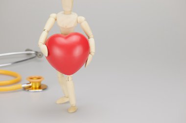 Ahşap kukla kırmızı kalp tutan bulanıklık stetoskop beyaz arka plana sahip