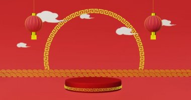 Altın kemerli kırmızı podyumda dönen lamba ve bulutlar var.