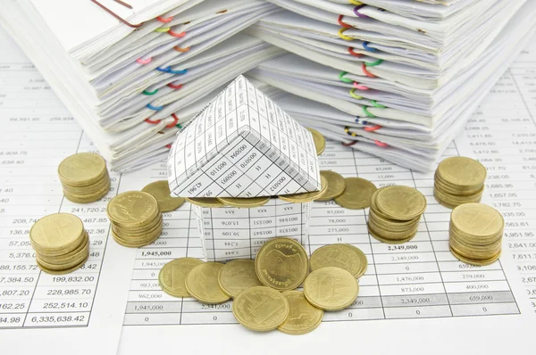 House with gold coin overload — Stock Photo, Image