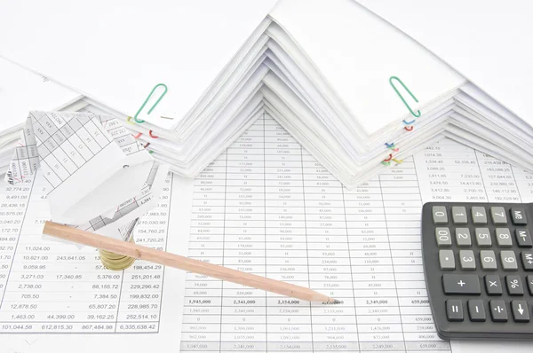 Santa Claus on gold coins hold pencil with calculator — Stock Photo, Image