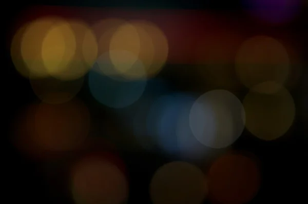 Defocused of yellow and red glitter or bokeh — Stock Photo, Image