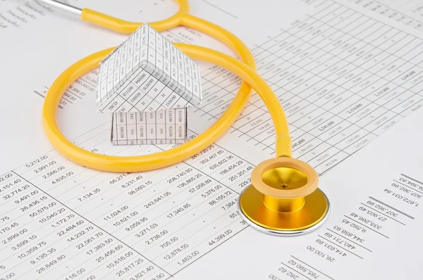 Yellow and gold stethoscope coil house — Stock Photo, Image