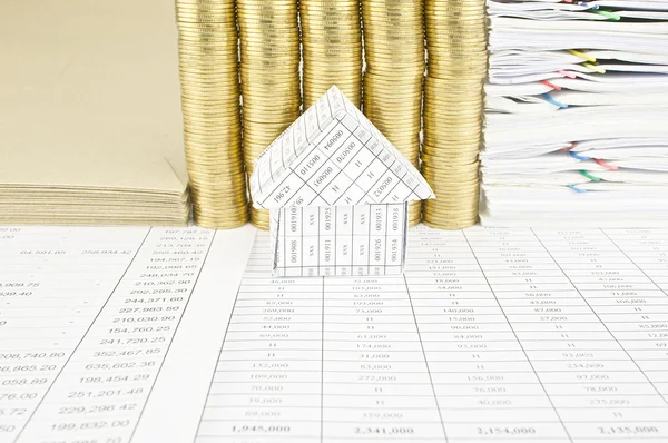 House in front of pile of gold coins — Stock Photo, Image