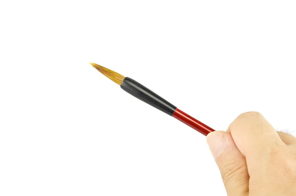 Man Holding red Chinese writing brush isolate with white background — Stock Photo, Image