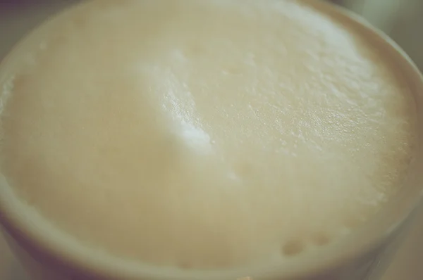 Froth milk on cappuccino coffee vintage style — Stock Photo, Image