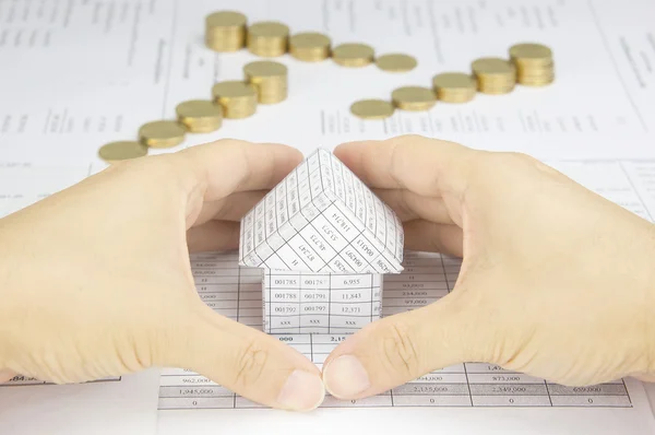 Man protect around house have blur step of gold coins — Stock Photo, Image