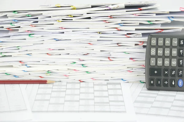 Brown pencil on finance account near pile of document — Stock Photo, Image