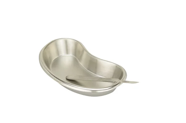 Stainless steel blade in kidney-shaped bowl isolated — Stock Photo, Image