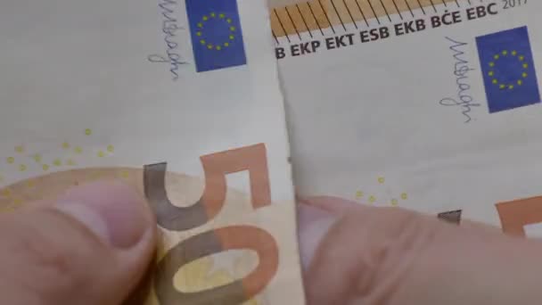 Man Tellen Eurobankbiljetten — Stockvideo