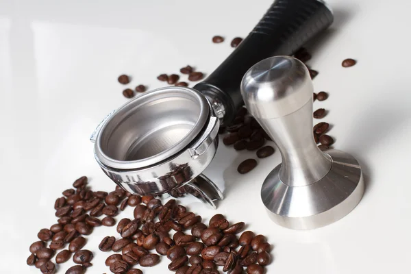 Portafilter and Tamper with arabica seeds — Stock Photo, Image