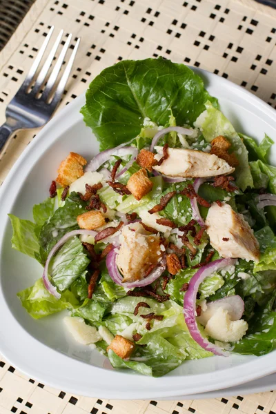 Bowl of caesar salad placed — Stock Photo, Image