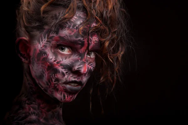 Chica con arte de la cara pintada oscura —  Fotos de Stock