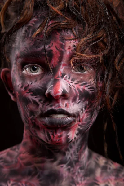 Girl with dark painted face art — Stock Photo, Image
