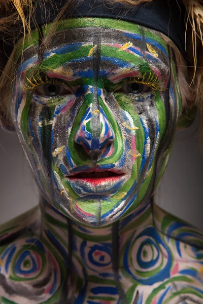 Woman with traditional african tribal face paint — Stock Photo, Image