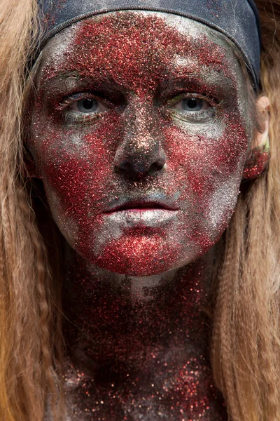 Female demon with face art — Stock Photo, Image