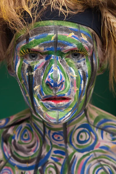 Woman with traditional african tribal face paint — Stock Photo, Image