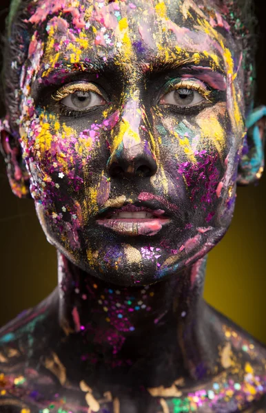 Mulher com arte facial criativa — Fotografia de Stock