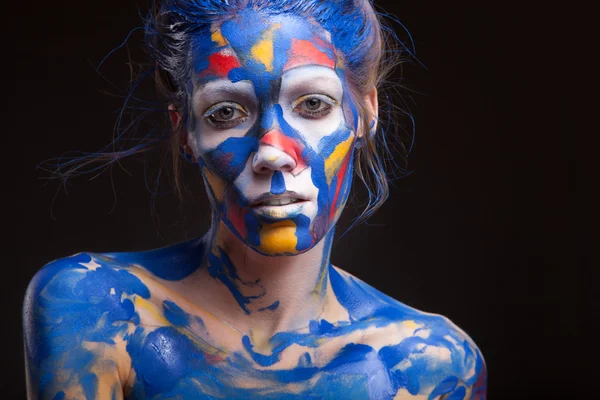 Rostro de una mujer cubierta de pintura —  Fotos de Stock