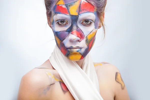 Woman with face art — Stock Photo, Image