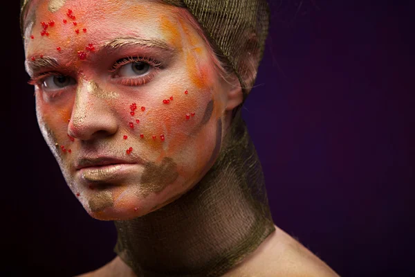 Dívka s color tvář umění — Stock fotografie