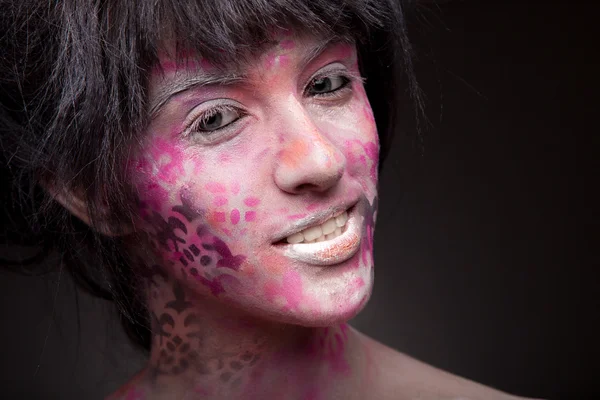 Woman with pink body art and face art — Stock Photo, Image