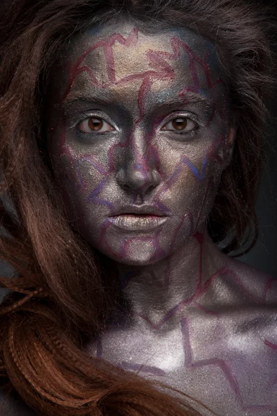 Face of a woman covered in glitter — Stock Photo, Image