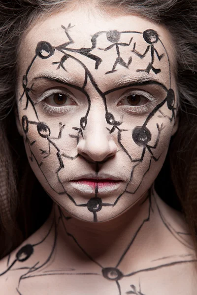Kvinna med kreativa ansikte konst — Stockfoto