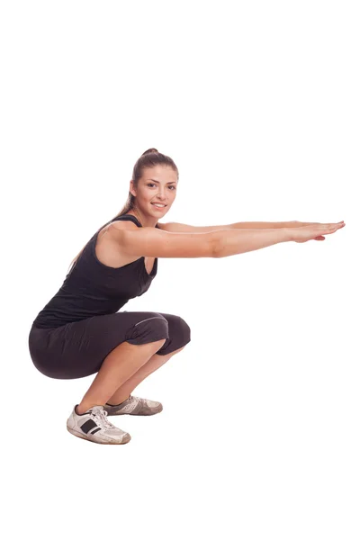 Athletic woman exercising — Stock Photo, Image