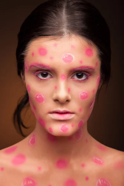 Woman with cherry face art — Stock Photo, Image