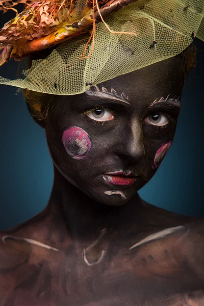 Black painted woman — Stock Photo, Image