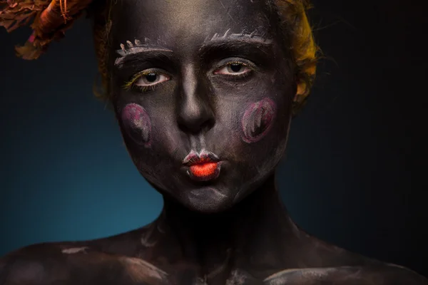 Black painted woman — Stock Photo, Image