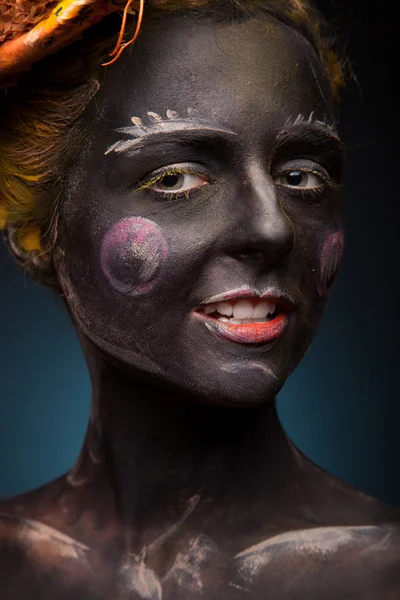 Black painted woman — Stock Photo, Image