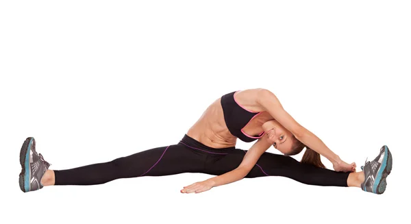 Deporte chica haciendo yoga estiramiento ejercicio —  Fotos de Stock