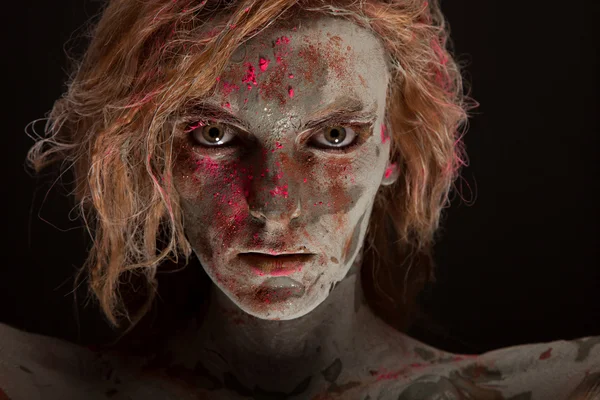 Woman covered in healing clay — Stock Photo, Image