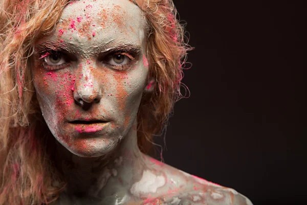 Woman covered in healing clay — Stock Photo, Image