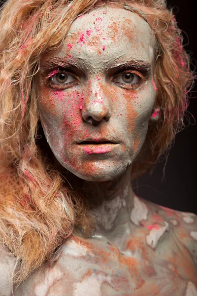 Woman covered in healing clay — Stock Photo, Image