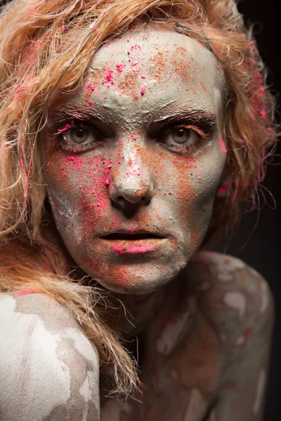 Woman covered in healing clay — Stock Photo, Image