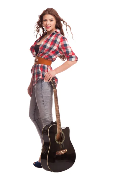 Young female musician with guitar — Stock Photo, Image