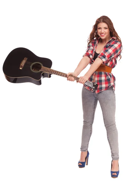 Young female musician with guitar — Stock Photo, Image