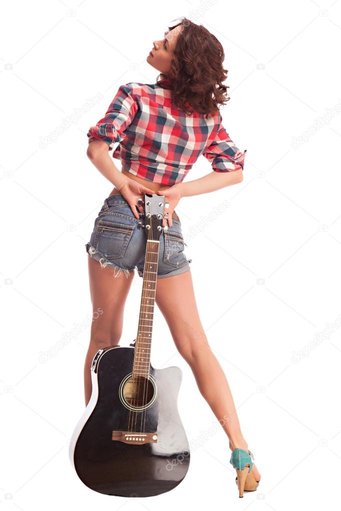 Young female musician with guitar