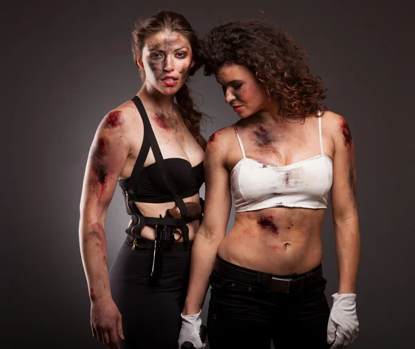 Armed strong female killers — Stock Photo, Image