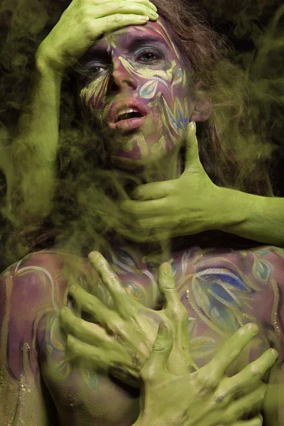Mujer pintada con arte facial — Foto de Stock