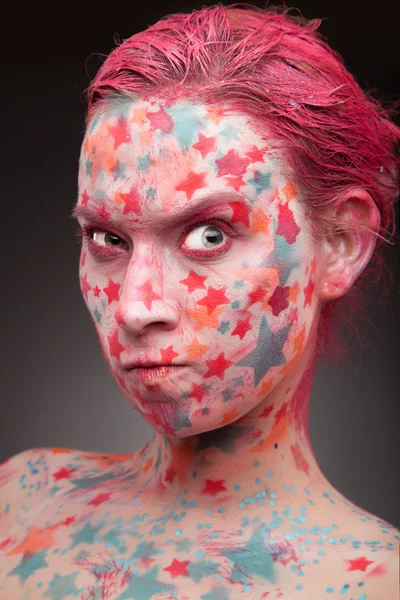 Angry woman with stars on the face — Stock Photo, Image