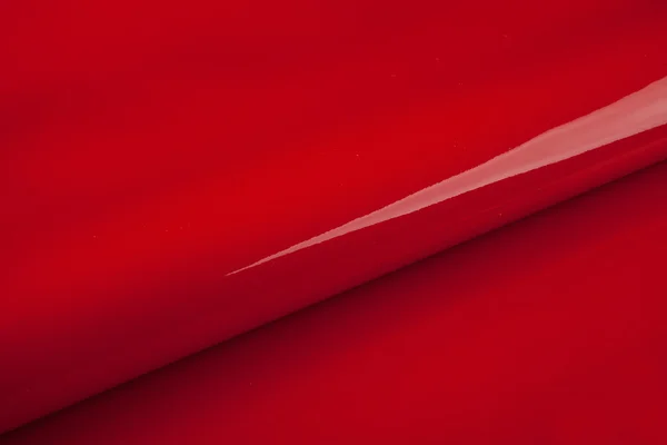 Texture de surface lisse et brillante rouge — Photo
