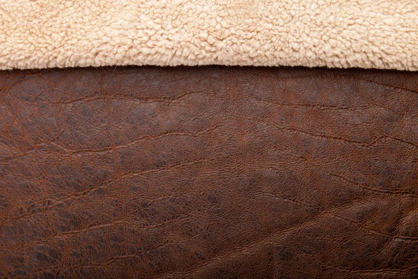 Bruin gelooid leder textuur close-up — Stockfoto