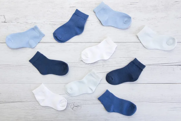 Baby socks with different shades of blue
