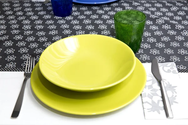 Table set with colorful dishes — Stock Photo, Image