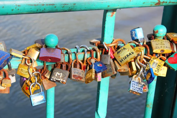 Bridge with padlocks hanged by couples, Wroclaw, Poland