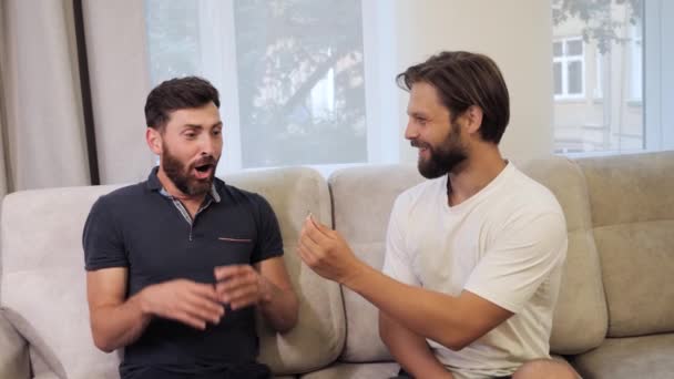 Man proposing to his beloved sweetheart with engagement ring at home. — Stock Video